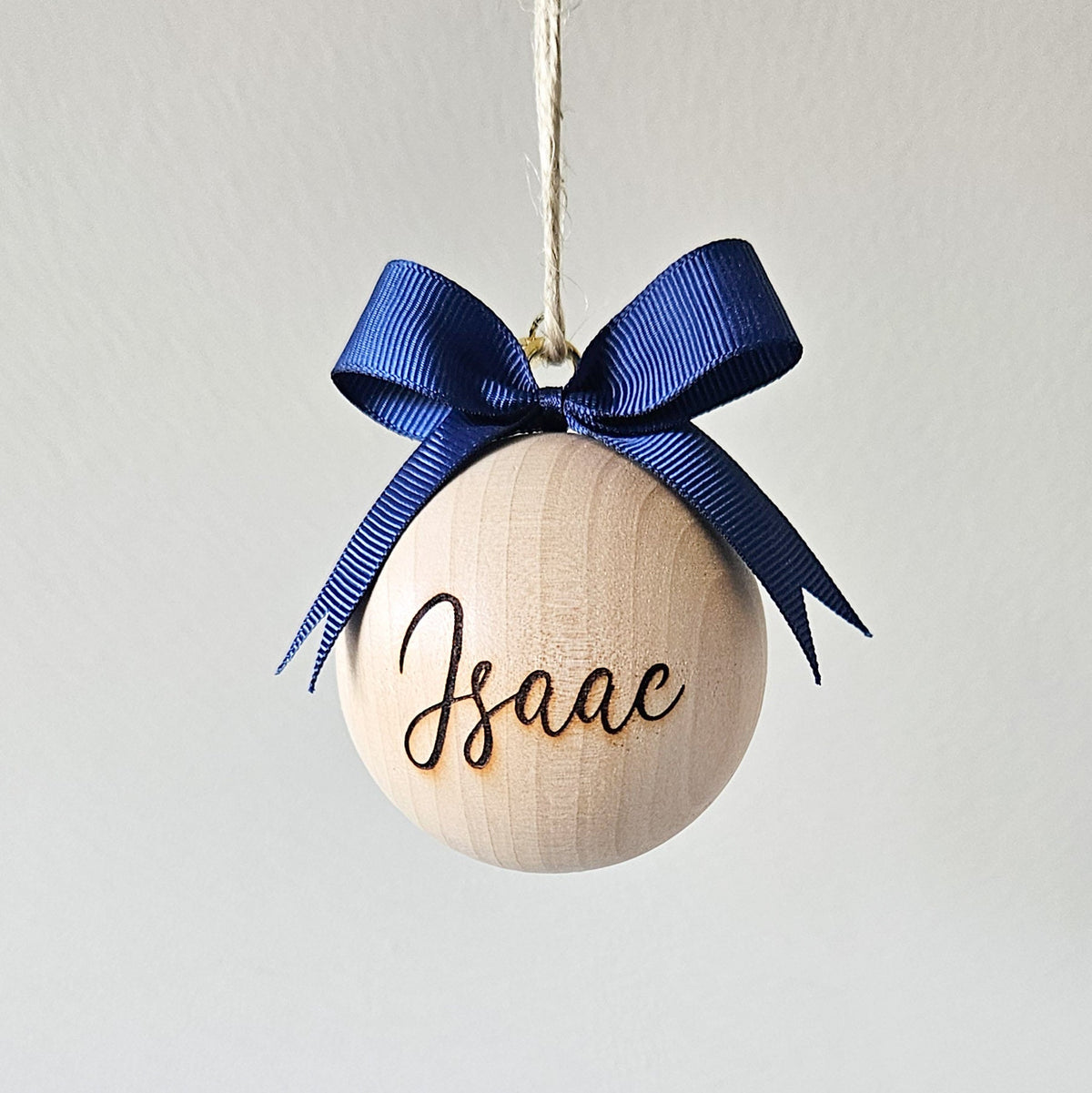 Limited Edition Sapphire grosgrain bow colour reference on a 6 cm wooden bauble